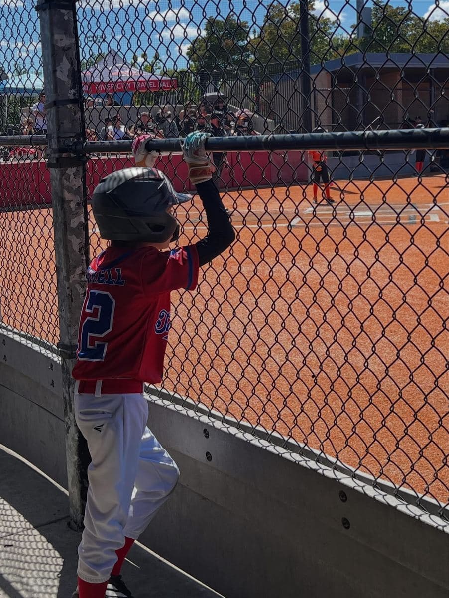 Watching from the dugout